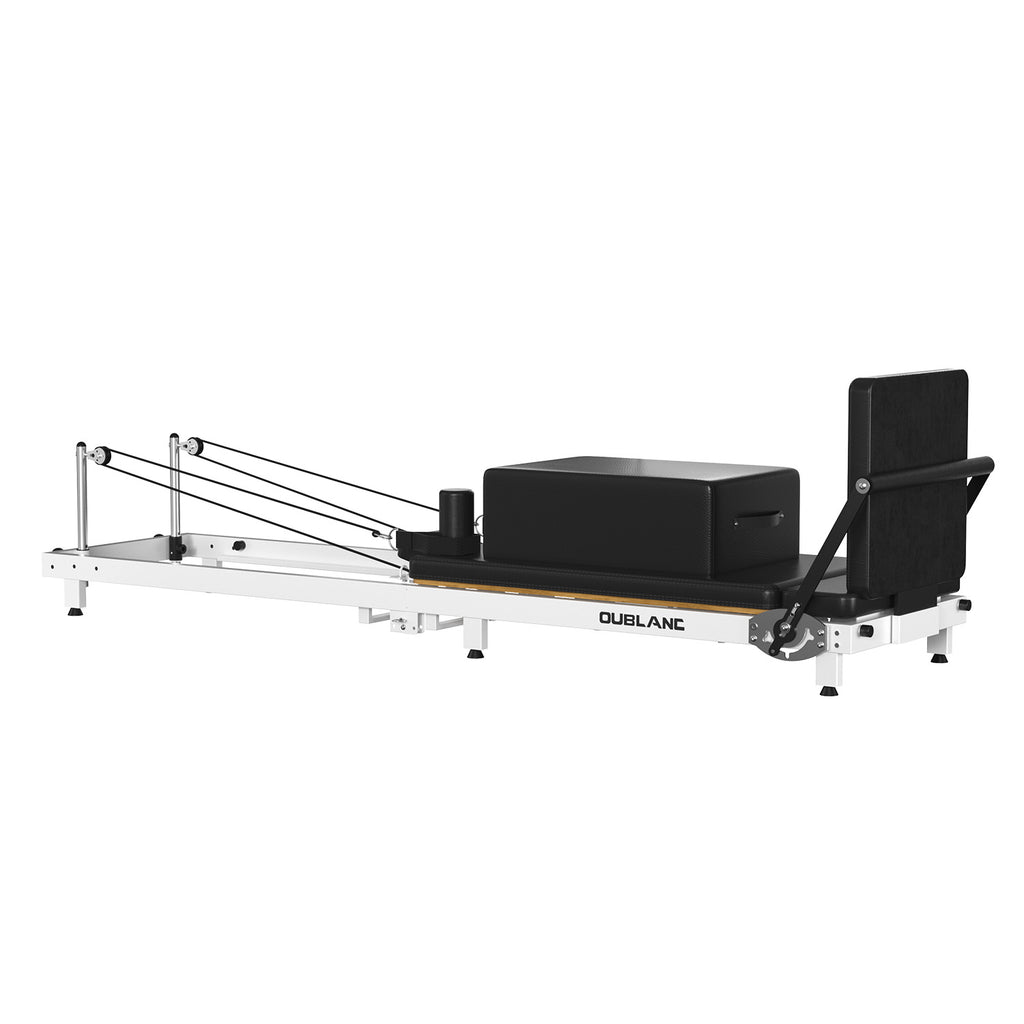 OUBLANC RT-101 Foldable Pilates Reformer, featuring a white steel frame, black carriage, black jump board, black sitting box, and black foot bar, set on a solid white background.