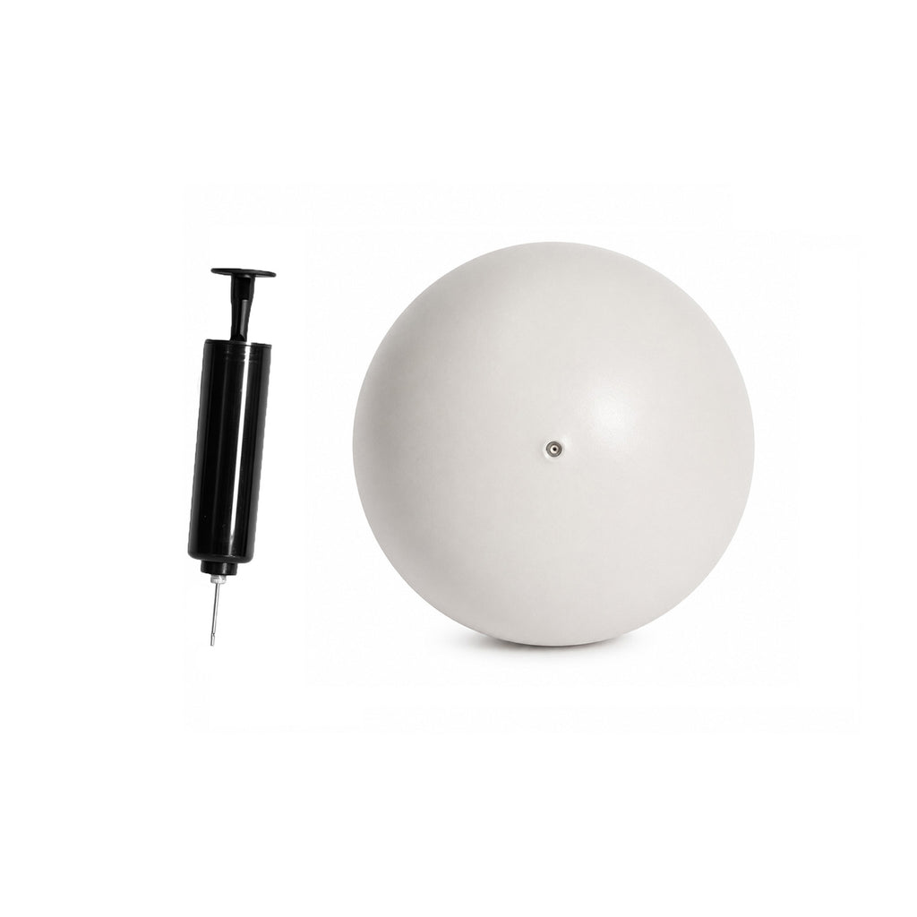 A light gray Pilates ball with a black manual air pump, shown on a clean white background.