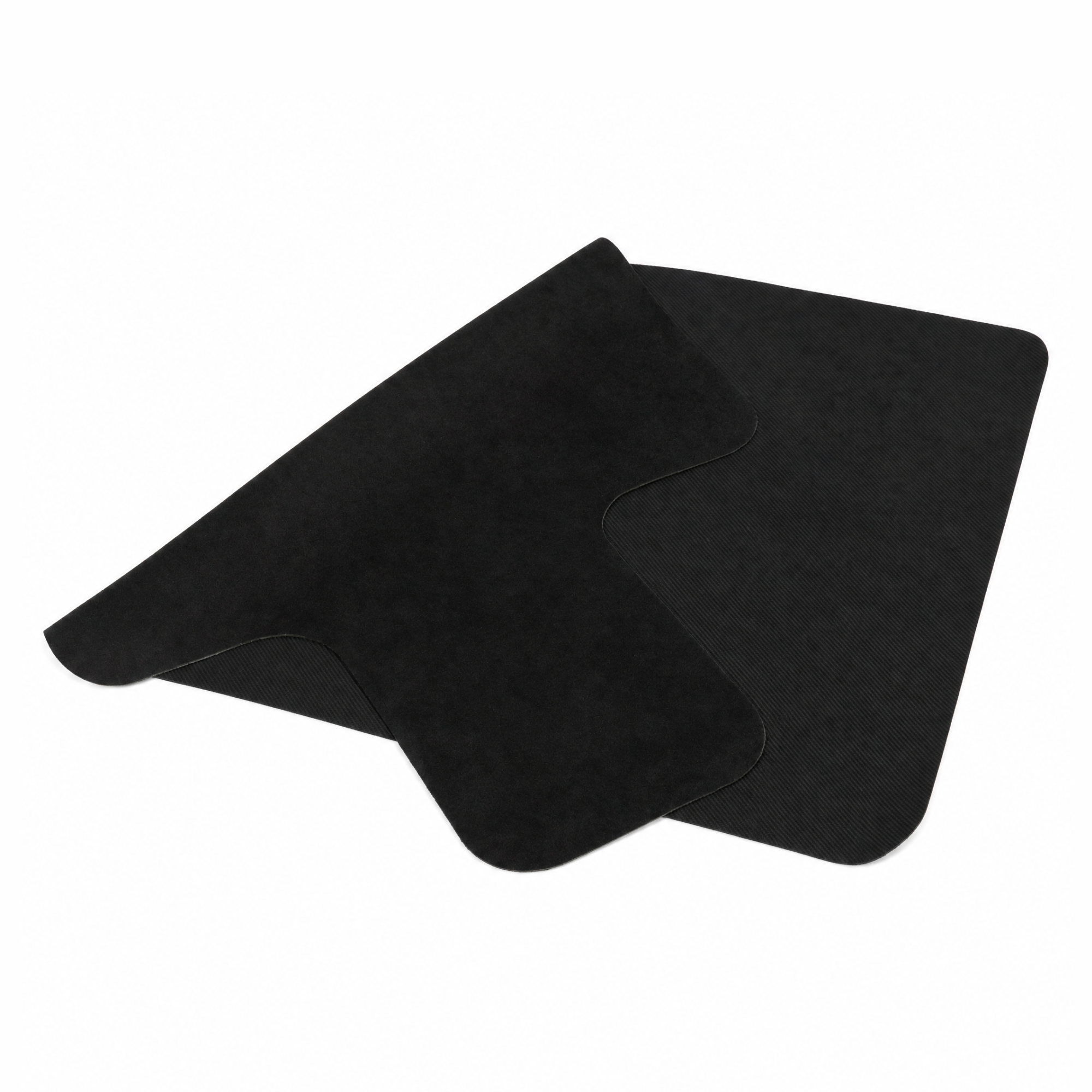 An ultra-slim Pilates reformer mat folded up on a white background.